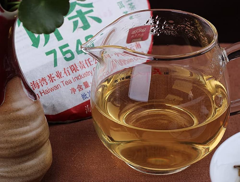 メロン　2006年ものプーアール茶×2 生茶×1 Amazon.co.jp: 中国プエル茶 357g (0.787LB) 生プーアル茶老班章